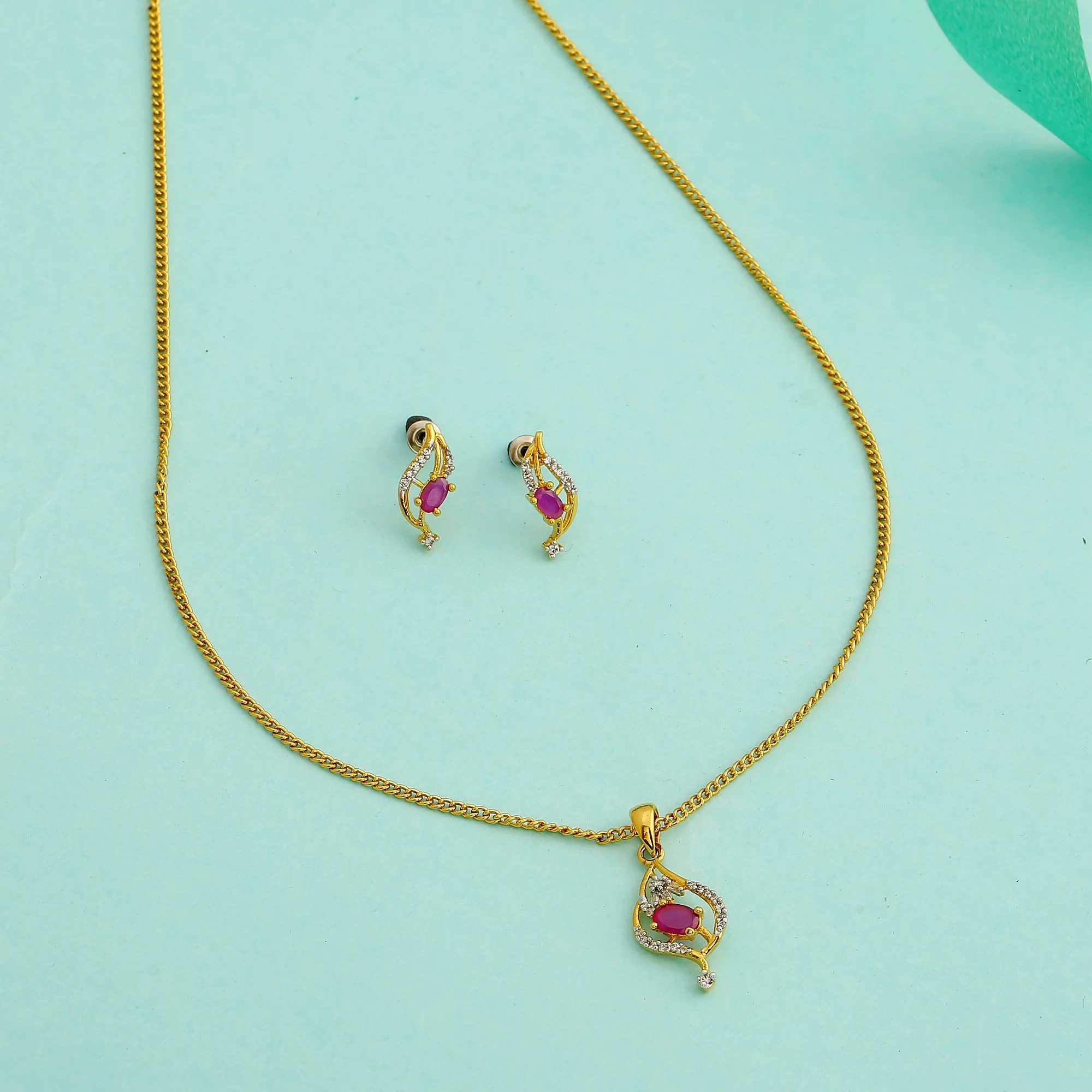Modern Gold and silver plated American diamond Caught in a wave ruby Necklace